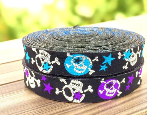 Glittering skull webbing - Elegant contrasts in black, also available in blue