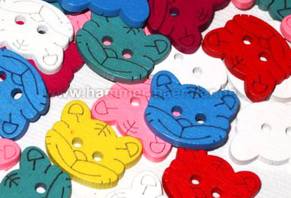 Wooden button in the shape of a cat