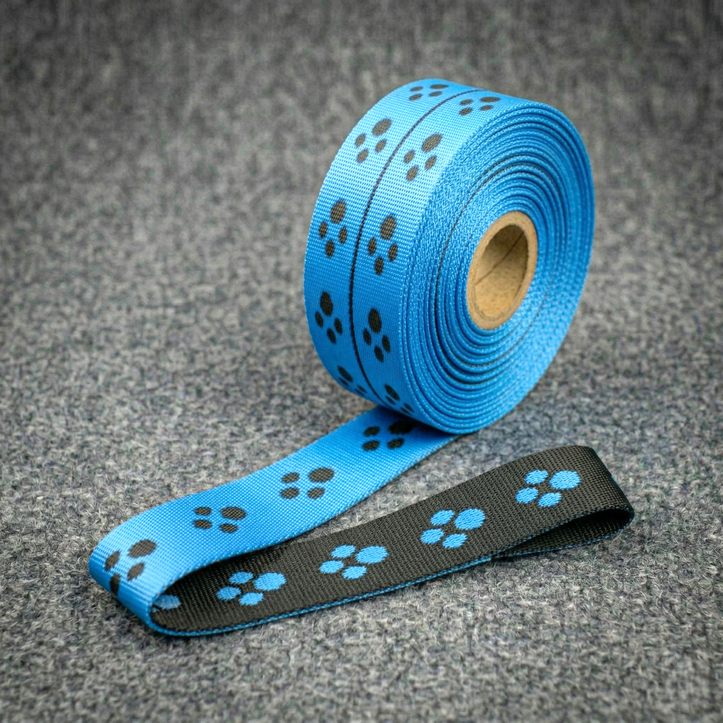 Double-sided pattern with paw prints in pink and blue