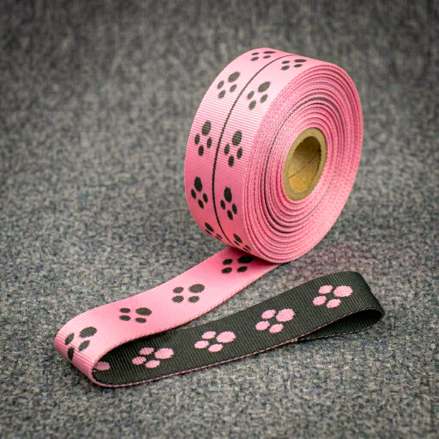Double-sided pattern with paw prints in pink and blue