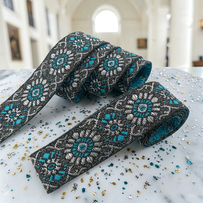 Shiny woven ribbon with floral ornament - 19mm