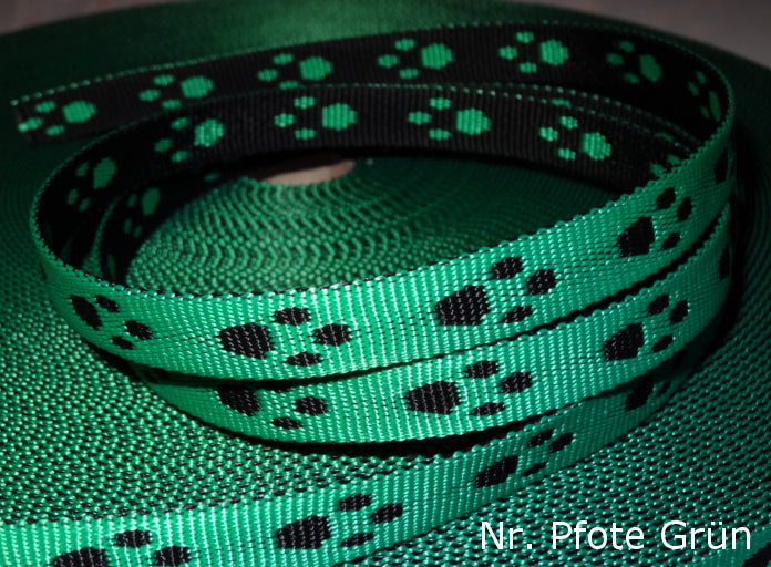 Doppelseitiges Muster mit Pfoten in Rosa und Blau