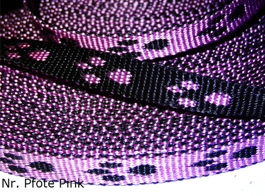 Doppelseitiges Muster mit Pfoten in Rosa und Blau